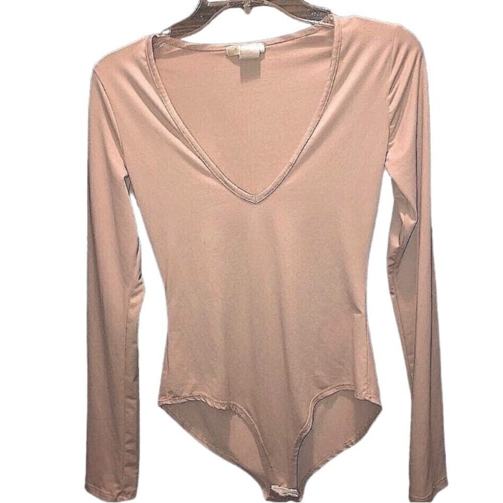 La gypsy bodysuit in Cream/ beige color Sz med